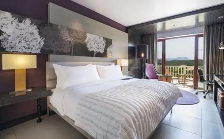 Luxurious bedroom of a resort in Mahabaleshwar