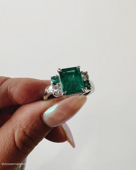 emerald engagement rings white gold modern diamond side stones alyssaannajewelry