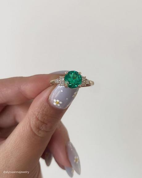 emerald engagement rings round cut solitaire side diamonds alyssaannajewelry
