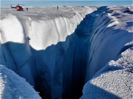 The high meltwater discharge in combination with a thick and gently sloping ice sheet in West Greenland leads to monster holes like this moulin.  Alun Hubbard