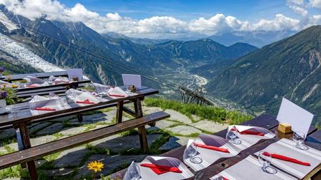 Tour du Mont Blanc: Insights for Hikers Tables set at restaurant overlooking a valley on the TMB