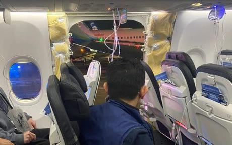 Shirt torn off child’s back after door blows out in mid-air Shirt torn off child’s back after door blows out in mid-air