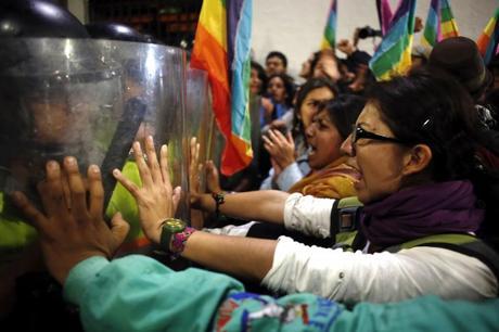 The Amazon women clash with riot police during a protest against the Federal Government and the resolution about oil exploitation on October 17 2013 in Quito, Ecuador. Credit: Edu Leon/LatinContent/Getty Images