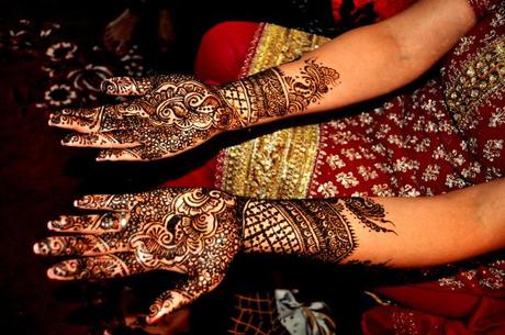 Indian bride with Henna patterns on hands