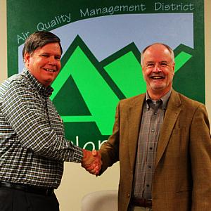 Antelope Valley AQMD Operations Manager Bret Banks welcomes Vern Lawson's return to the governing board - courtesy AVAQMD