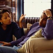Couple Arguing in Living Room