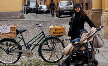 ReasonsToDress.com walking through the streets of Modena,Italy.  Real Mom Street Style in black cropped leather gloves, Peter Flowers Over the Knee Leather Boots and a handmade hat by Federica Moretti Handmade. 