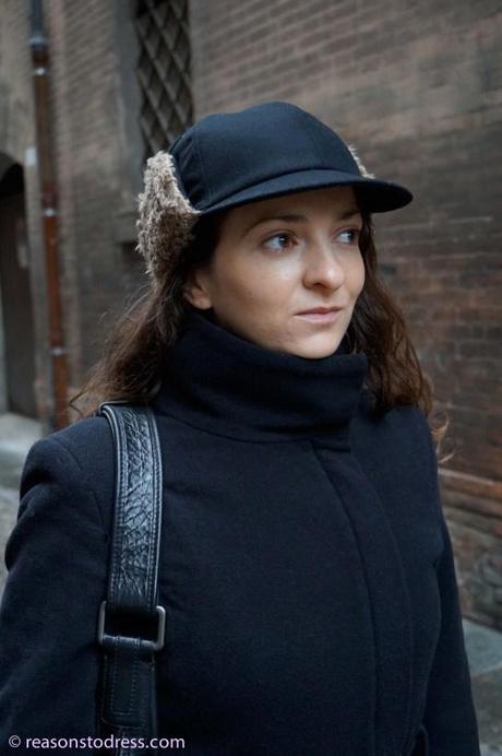 ReasonsToDress.com walking through the streets of Modena,Italy.  Real Mom Street Style in black cropped leather gloves, Peter Flowers Over the Knee Leather Boots and a handmade hat by Federica Moretti Handmade. 