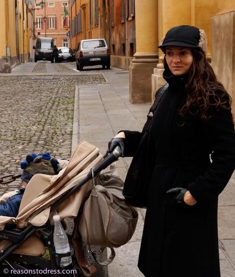 ReasonsToDress.com walking through the streets of Modena,Italy.  Real Mom Street Style in black cropped leather gloves, Peter Flowers Over the Knee Leather Boots and a handmade hat by Federica Moretti Handmade. 
