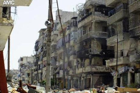 This image from Aleppo Media Center, authenticated by the Associated Press, shows damaged buildings in Syria's former economic heartland.