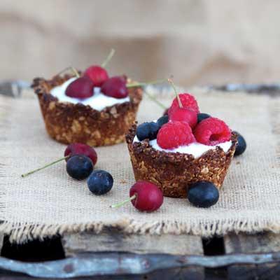 Granola cups filled with yoghurt and berries