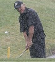 Greg Norman in rain