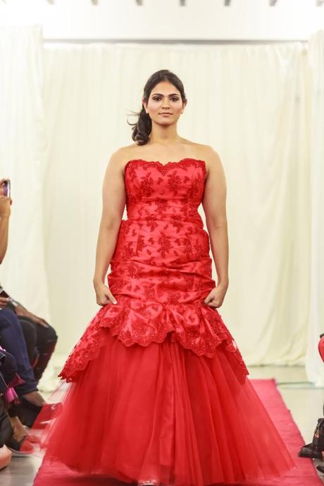 Curvy bride in red wedding dress