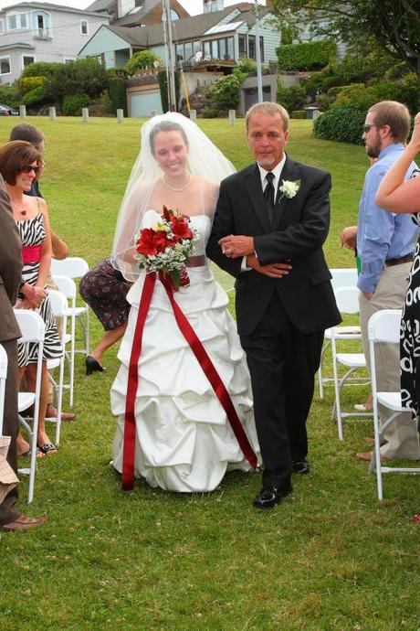 Father walking daughter down the aisle