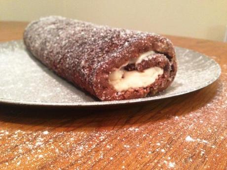 baileys cream chocolate swiss roll dinner party dessert silver serving plate sprinkled with caster and icing sugar