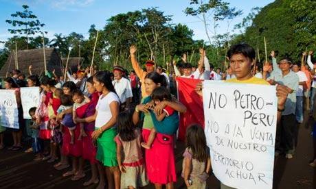 Achuar protesting Peru’s state oil company’s plans to operate on their land, 9 May 2013. Photograph: Amazon Watch