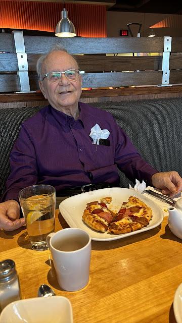 dad with pizza