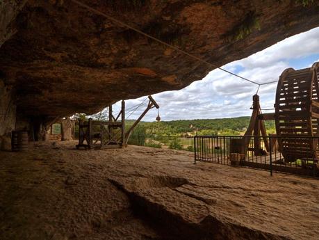 Prehistoric cliff dwellings and wooden contraptions in La Roque St-Christophe