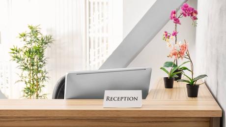 Is a Reception Desk Necessary in Your Office? Considering the Pros and Cons
