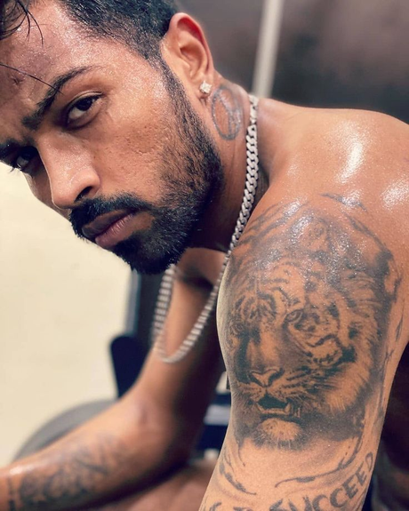 All 8 Hardik Pandya Tattoos With Deep Meaning 8 Hardik Pandya Tiger Tattoo (Left Arm)