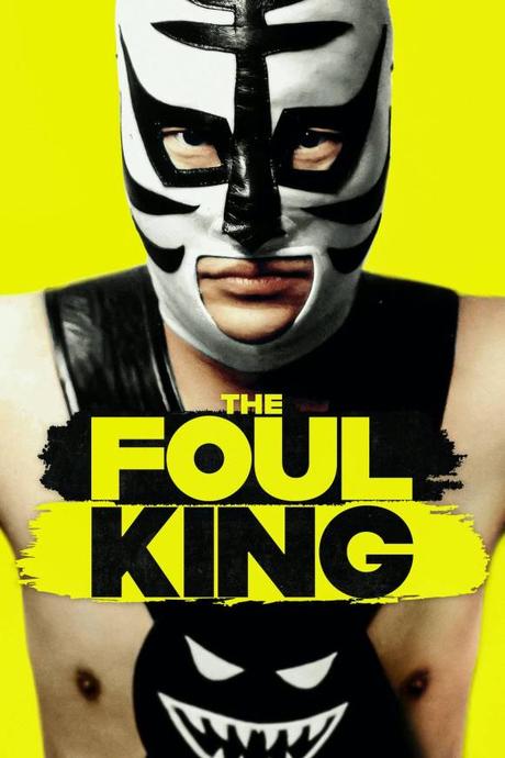 Discover the hilarious and heartwarming journey of a wimpy bank clerk turned pro wrestler in The Foul King movie review.