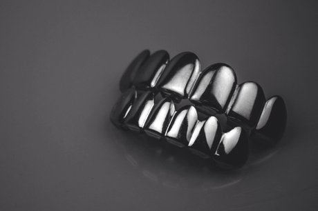 The God or Guns Platinum Tone Grills Set