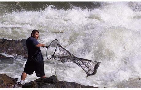 Nolan Alec catches a salmon on the Fraser River, near Lillooet.