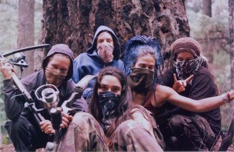 The Womyn's action group poses for a photo at the 2004 Straw Devil Action Camp in the Willamette National Forest. This camp is seen as the origin of TWAC