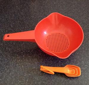 Riccarton Rotary Sunday market Retro vintage thrifted op shop finds Tupperware measuring spoons orange colander