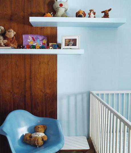 
  Inside their Upper West Side co-op, architect Brad Zizmor and his wife, Susan, selected birch-finished shelves from Ikea and a 1950s fiberglass shell chair from Modernica for their son's bedroom. Read the whole story here.
  
