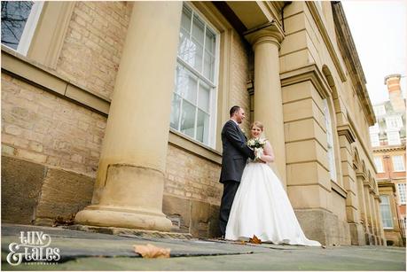 Bride and groom cuddle at York Wedding