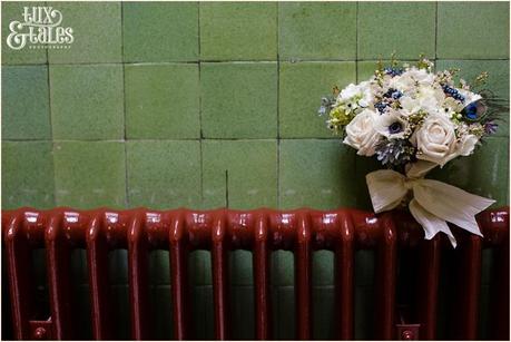 Wedding bouquet in radiator at Cedar Court Grand in York with winter flowers