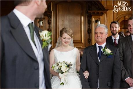 Bride walks up aisle at York wedding