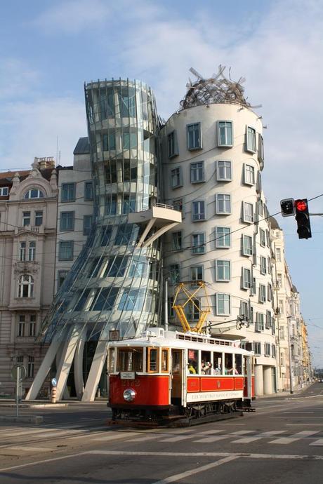 dancing house in prague with red tram nzmuse