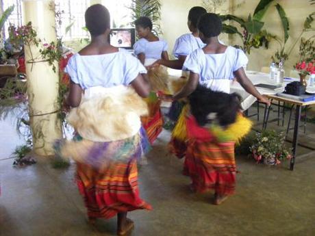 Students performing traditional music and dance in celebration of conservation. culture of Uganda