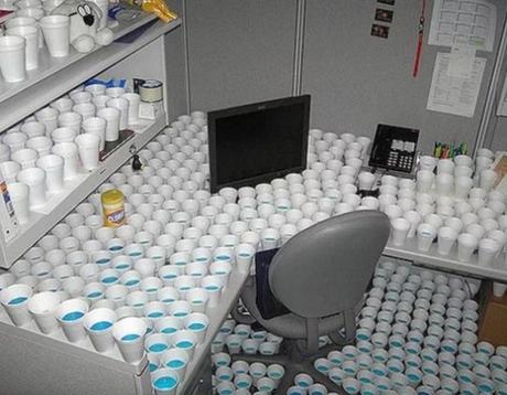 Dentists office filled with cups of mouthwash as a prank