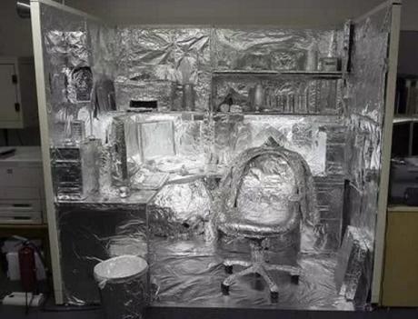 Office covered in tin foil for April fools joke