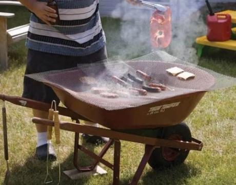 Wheelbarrow turned into a BBQ