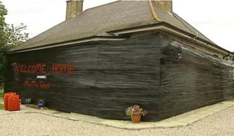 House covered in silage wrap