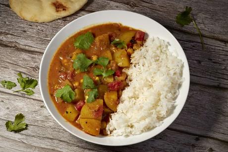 bowl of easy potato chickpea curry with rice
