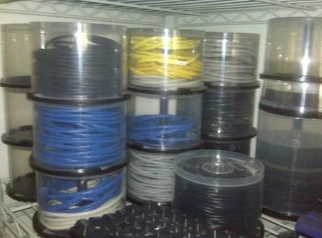 Empty Disk Spindles Turned into Cable Organizer