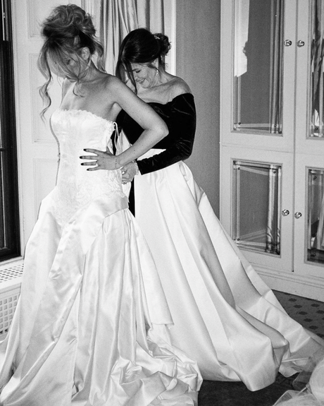 kate wasserbach and travis moore real wedding bride getting ready black and white photo