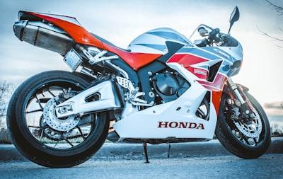 Explore the Exciting Features of 2024 Honda Motorcycles: An In-Depth Review 3 white and orange Honda sportbike