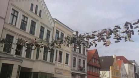 Shoe Tossing: Shoes Hung Over a Telephone Line