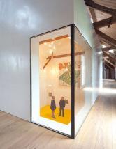 Corian-clad gallery into old timber armoury by Bureau SLA