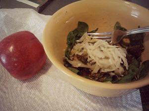 Monday lunch. Miracle noodles dry-sauteed with some peanut butter/cayenne pepper/almond milk for a spicy peanut sauce, with spinach and sauerkraut added in. Organic honeycrisp on the side. 