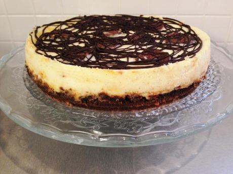 white chocolate and brownie cheese cake crunchy biscuit base topped with dark chocolate swirls