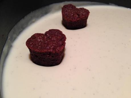 white chocolate and brownie cheesecake recipe setting hearts into batter