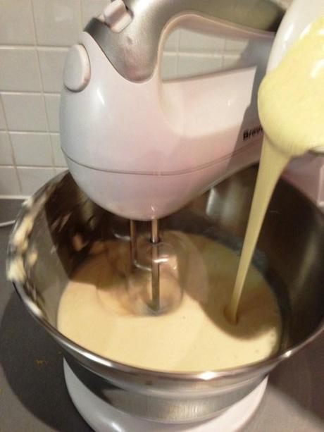 white chocolate cheesecake recipe pouring into stand mixed batter and creamy mix
