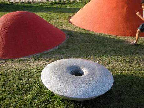 St Mary's Churchyard, Elephant and Castle, London - Playground Rubber Mounds in Grass